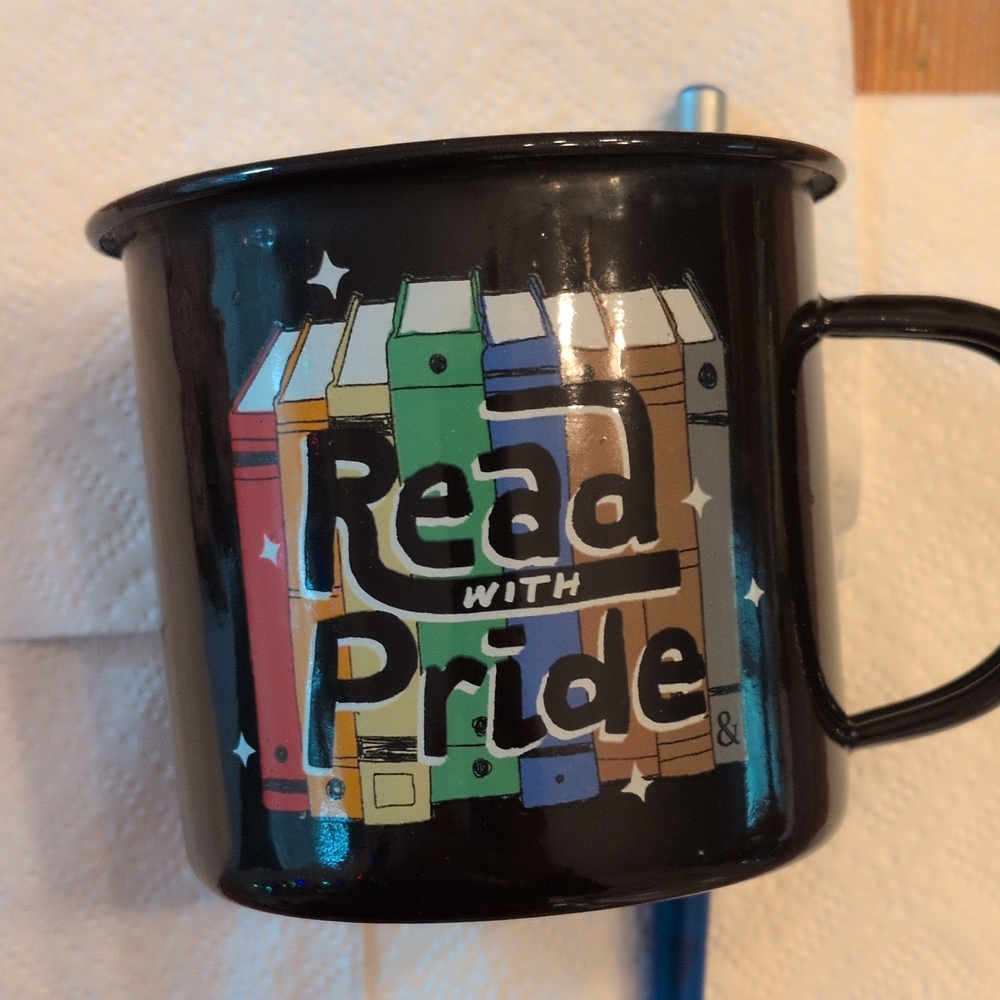 Out of Print Black "Read With Pride" Enamel Mug with Colorful Book Spine Graphic